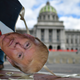 An effigy of Donald Trump held by anti-Trump protesters outside the Capitol Building of Pennsylvania on Jan. 17, 2021